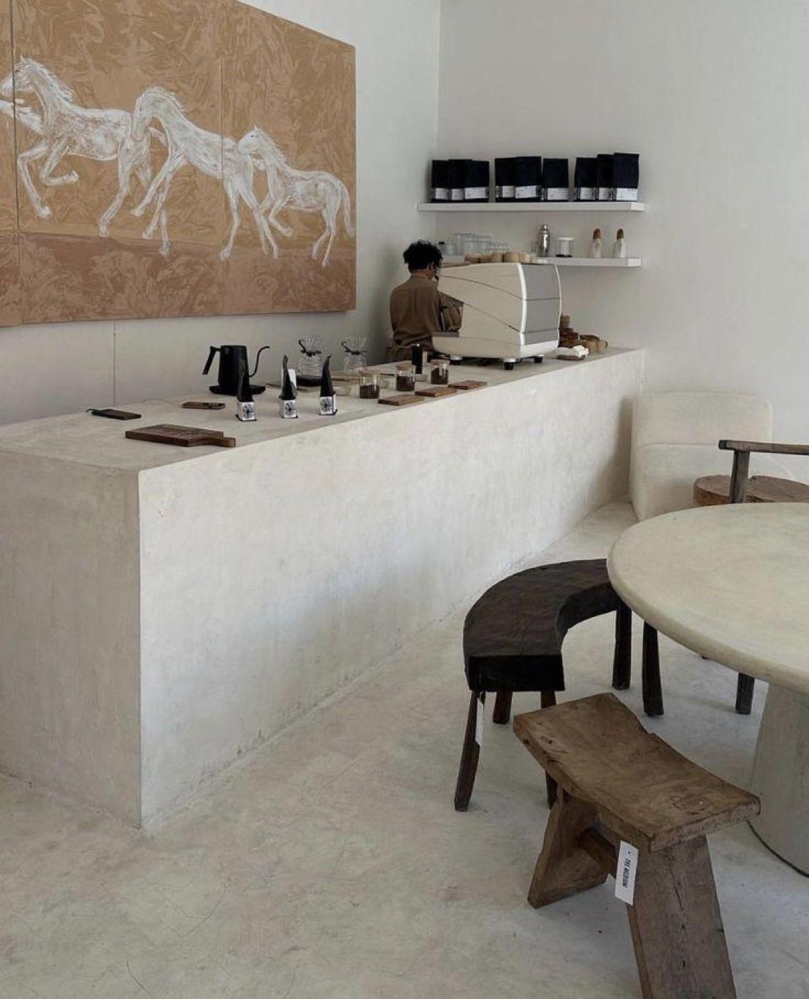 Pour-over kit and coffee tools laid out on a concrete counter